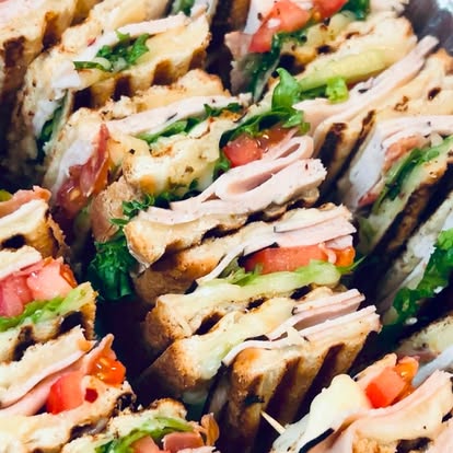 Stacked triangle-cut club sandwiches